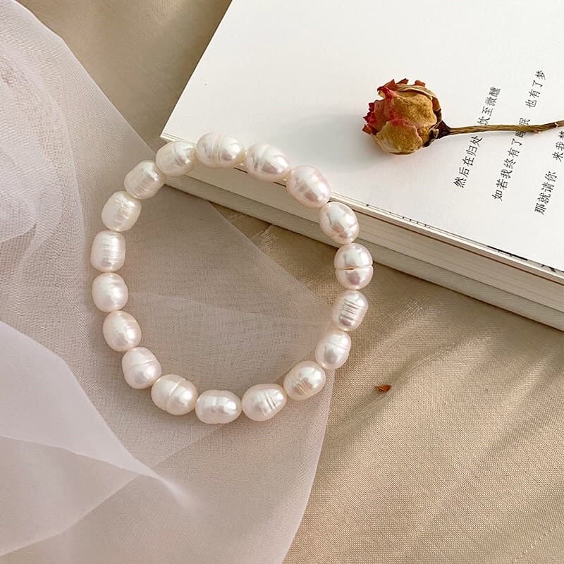 Vòng tay ngọc trai 8ly chỉ thun co giãn kiểu dáng tinh tế
